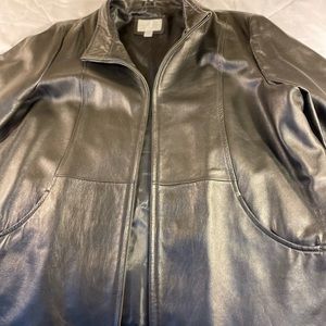 Beautiful genuine, lamb, skin jacket. Looks like new, color is black.